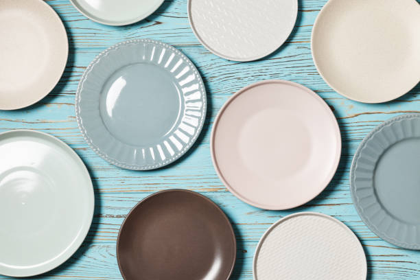 istock Set of dishes and kitchen utensils on a light background top view 1845710611
