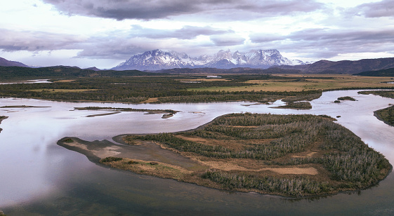 Serrano River with view to Cerro Torre, Torres del Paine, Chile. River Valley Serrano. The smooth curves of the river