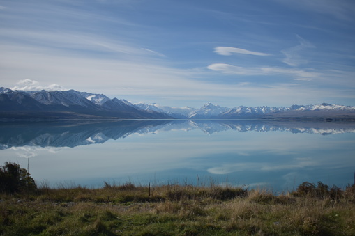 Happened upon this great calm day with the lake reflecting the southern alps and my cook behind