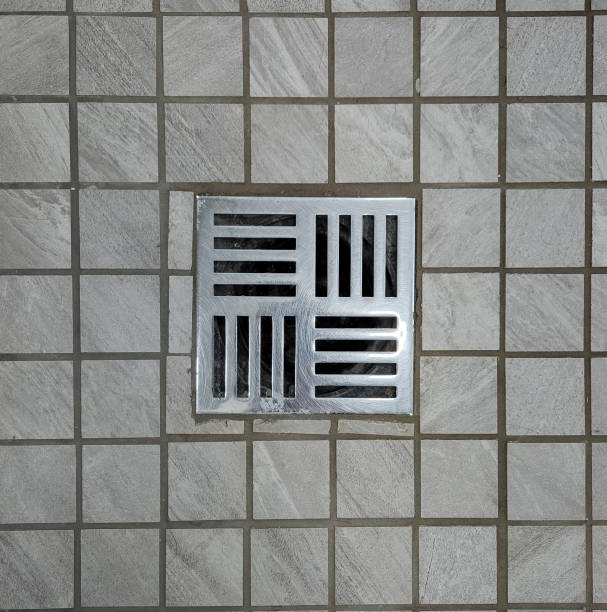 istock Shower stall floor drain stainless steel with tiled ground 1845803864