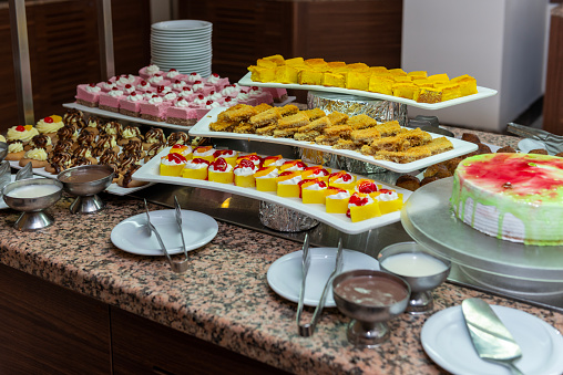 A lot of food and snacks on event catering.