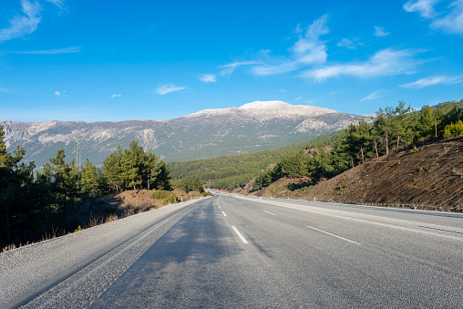 Highway with view of Taurus Mountains. Antalya, Turkey