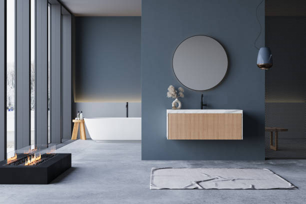 istock Modern bathroom interior with winter concept, white bathtub and chic vanity, black walls, parquet floor, plants, natural lighting. Minimal bathroom with modern furniture 1845856192