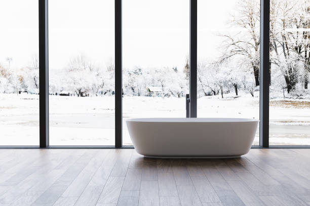 istock Modern bathroom interior with winter concept, white bathtub and chic vanity, black walls, parquet floor, plants, natural lighting. Minimal bathroom with modern furniture 1845857208