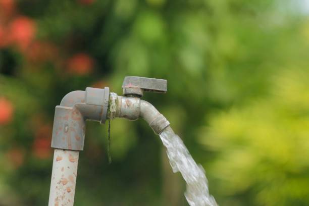 istock faucet water drop close up a blurred natural background 1845918190