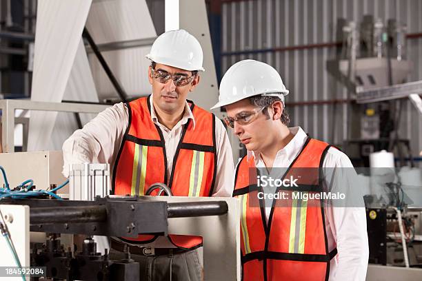 Engineers In Outsourcing Printing Industry Stock Photo - Download Image Now - Accuracy, Activity, Adult