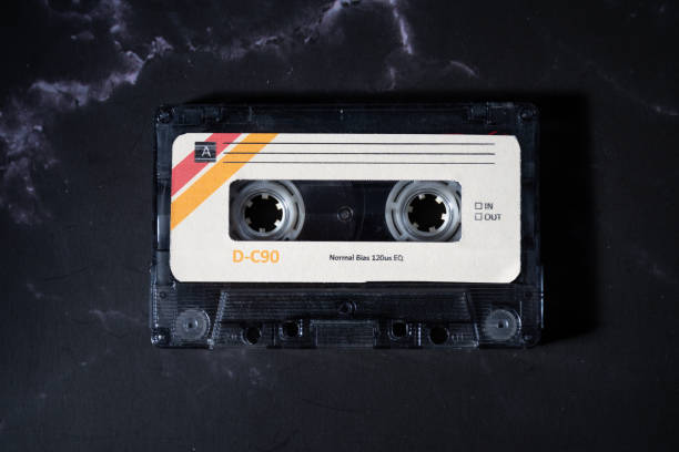 istock Colorful audio cassette on a dark background. 1845927496