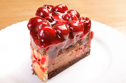 close up shot of sliced cherry cake.