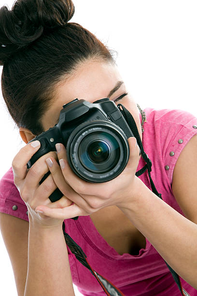 istock Woman photographer with camera 184593260