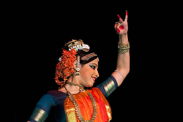 istock Young Indian woman dancing traditional dance. 184593940