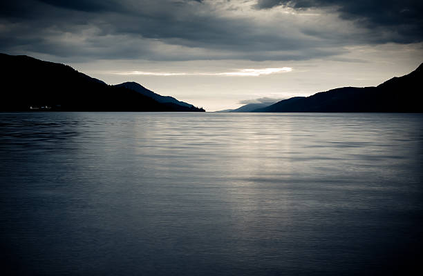 Loch Ness "Seascape view of Loch Ness looking out to sea from Fort Augustus, Scotland, UK." fort augustus stock pictures, royalty-free photos & images