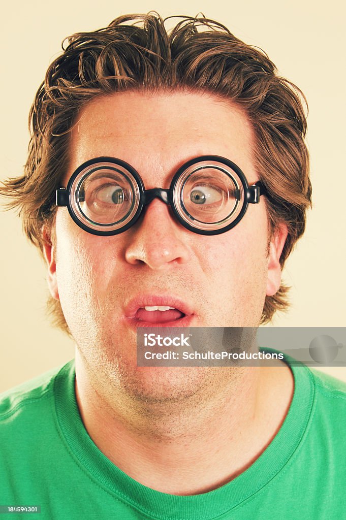 Uomo confuso faccia divertente - Foto stock royalty-free di Adulto