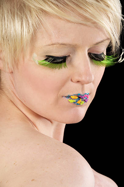 istock Blonde woman in green lashes. 184594524