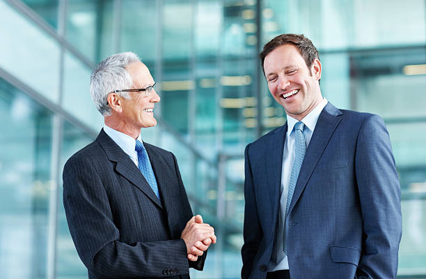 istock Male executives talking business 184594768