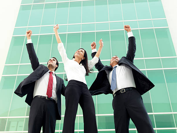 istock Cheerful business team celebrating 184594920