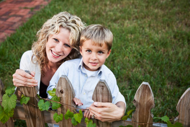 istock Mother and son in back yard 184595003