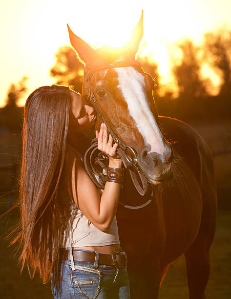 istock Girl with the horse 184595098