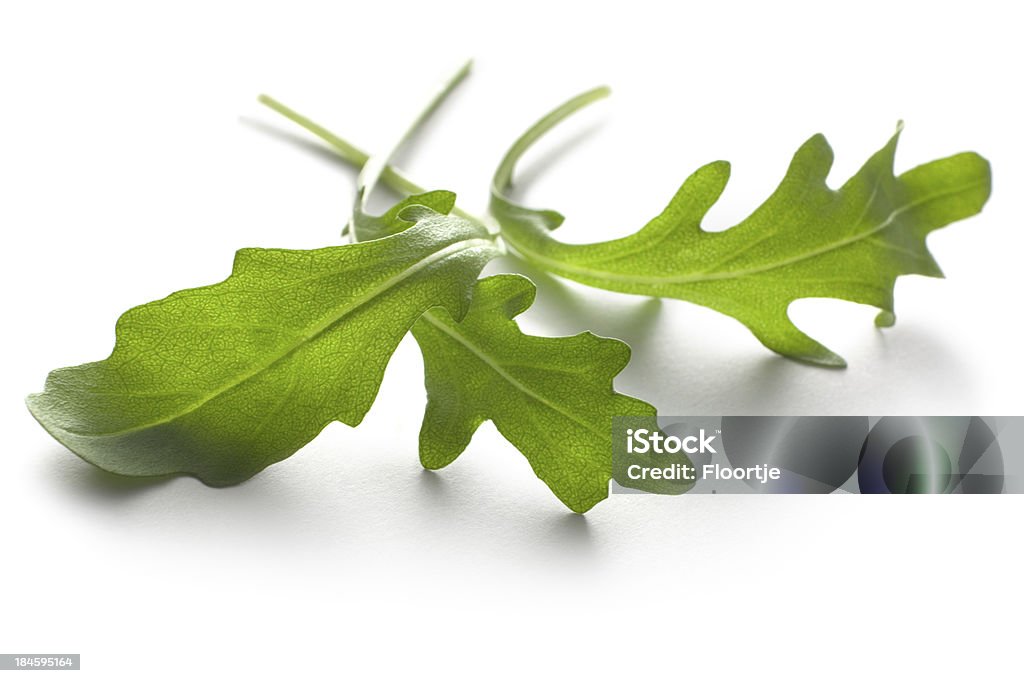 Vegetables: Arugula Lettuce Isolated on White Background More Photos like this here... Arugula Stock Photo