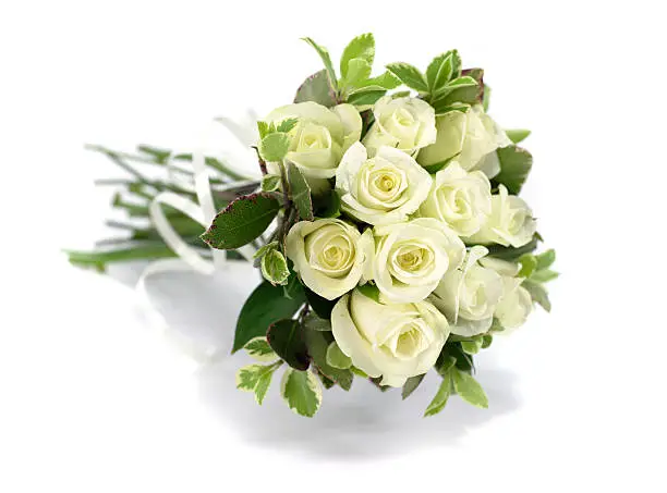Photo of White rose flower bouquet or wedding posy on isolated background