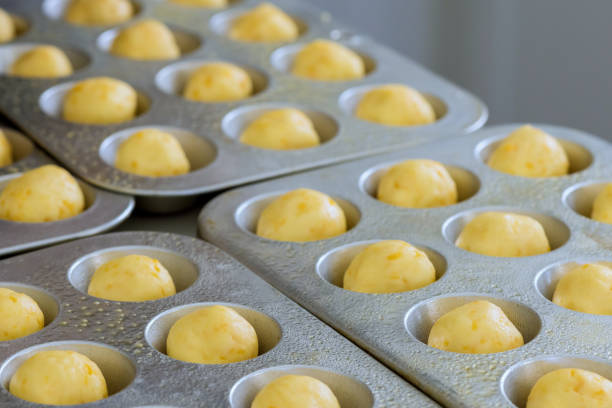 In ready for baking on baking pan tray, traditionally brazilian cheese chipa buns