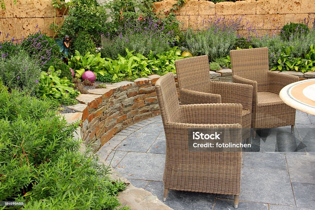 Sitting area Cozy sitting area in the garden Adirondack Chair Stock Photo