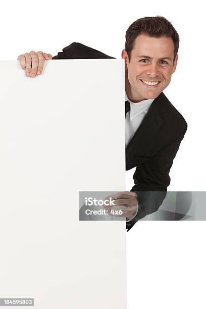 Businessman Holding A Placard And Smiling Stock Photo - Download Image Now - 20-29 Years, Adult, Adults Only