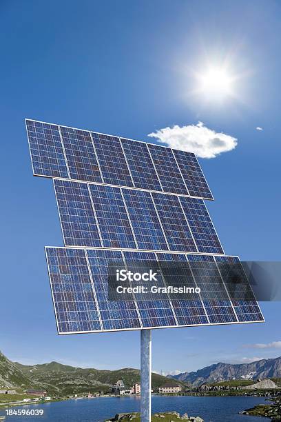 Blue Solar Panel In Front Of Nature Background Stock Photo - Download Image Now - Electricity, Energy Crisis, Environmental Conservation