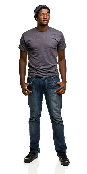 Photo of The portrait of a young black man, on jeans and a grey shirt