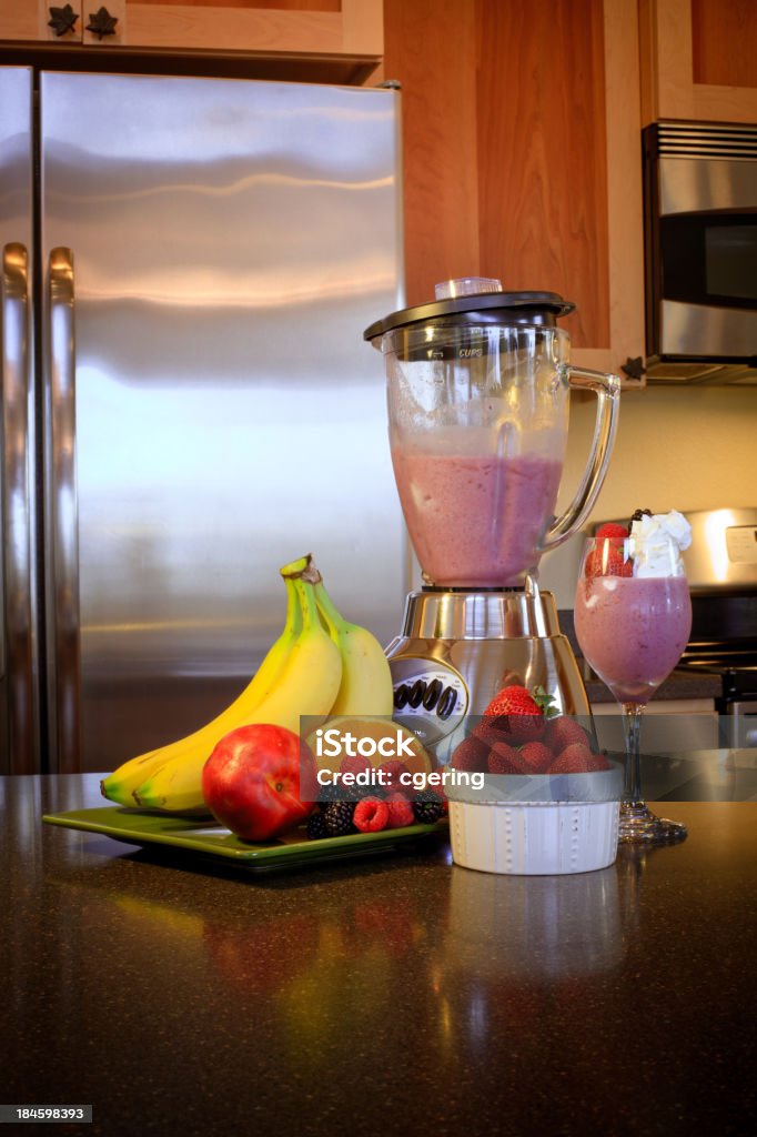 Fresh Fruit Smoothie "Ice-cold blended fruit smoothie, with fresh strawberries, bananas, and more! Delicious and nutritious!" Appliance Stock Photo