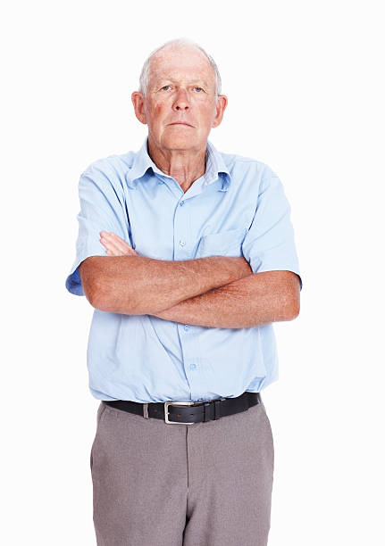 istock Serious senior man with arms crossed 184598512