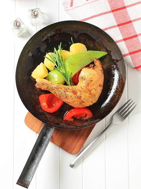 istock Chicken leg and vegetables 184598735