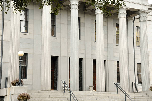 istock Neoclassical building front with fluted  columns and stairs. 184599349