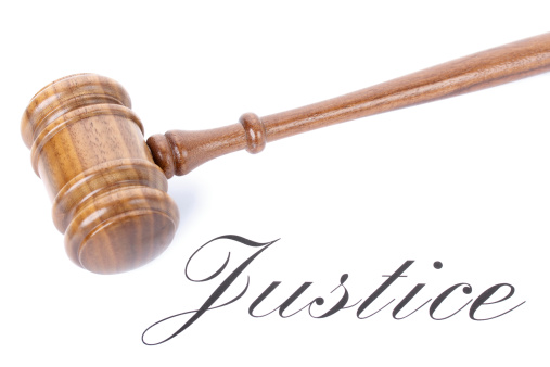 Wooden gavel and justice