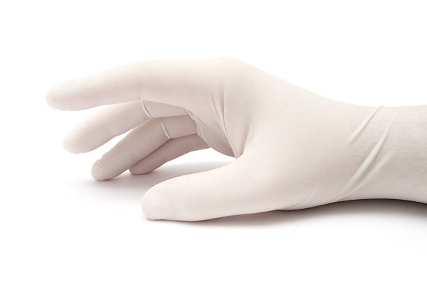 Doctor is Waiting Person wearing surgical gloves is waiting. Isolated on a white background. plastic gloves stock pictures, royalty-free photos & images