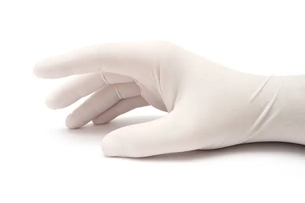 Person wearing surgical gloves is waiting. Isolated on a white background.