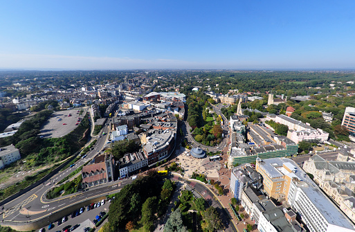 An aerial view over the popular tourist destination of Bournemouth, a seaside town in Dorset. Taken 500 feet from a balloon. Wide angle lense used. Logos removed and people too small/indistinguishable for model release.