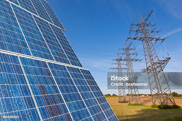 Solar Panel With Power Poles Stock Photo - Download Image Now - Cable, Electricity, Electricity Pylon