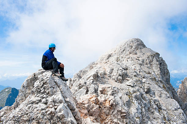 istock Alpinist at the mountain peak 184600580