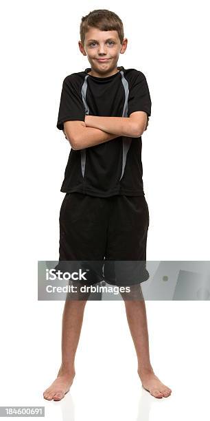 Confident Boy Crosses Arms Stock Photo - Download Image Now - Boys, Full Length, Arms Crossed