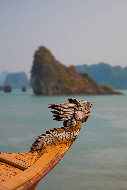 Dragon on junk boat, Halong Bay, Vietnam stock photo