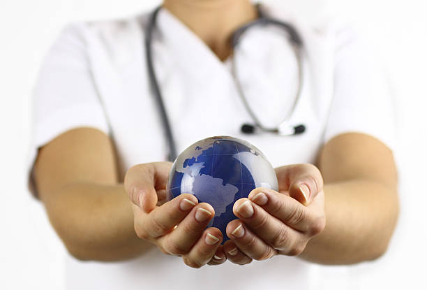 グローバルヘルスケア - globe human hand holding concepts ストックフォトと画像