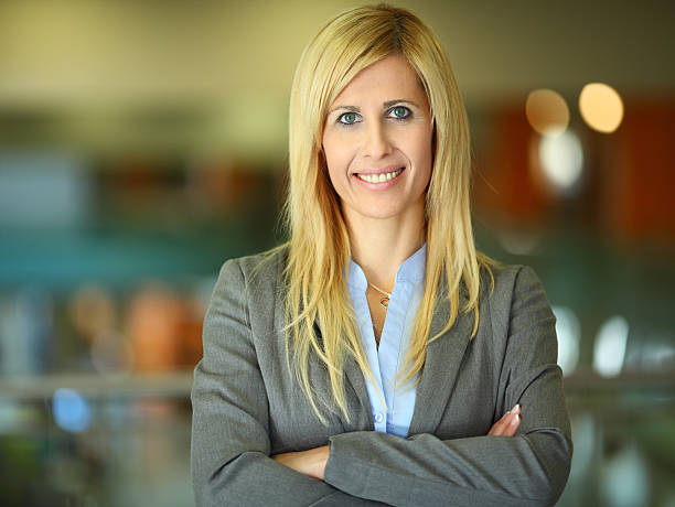 istock Smiling businesswoman in corporate environment. 184601570