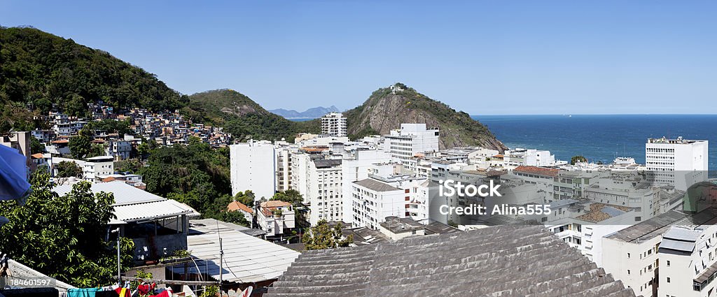 Panoramic view of neighborhood in Copacabana, Rio de Janeiro, Brazil "Panoramic view of neighborhood in Copacabana, Rio de Janeiro, Brazil - contrast of expensive hotels, appartment buildings and favela. You might also be interested in these:" Apartment Stock Photo