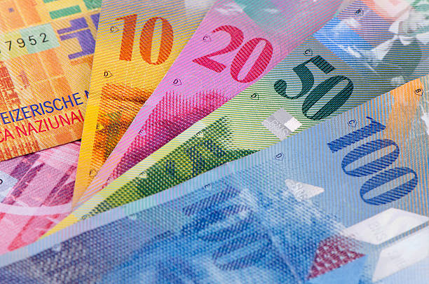 istock Colorful Swiss franc bank notes 184601924