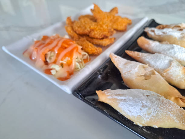 istock Delicious Chicken Katsu And Pisang Molen (Fried Banana Molen Crispy) On A Plate. Snack Menu 1846024730