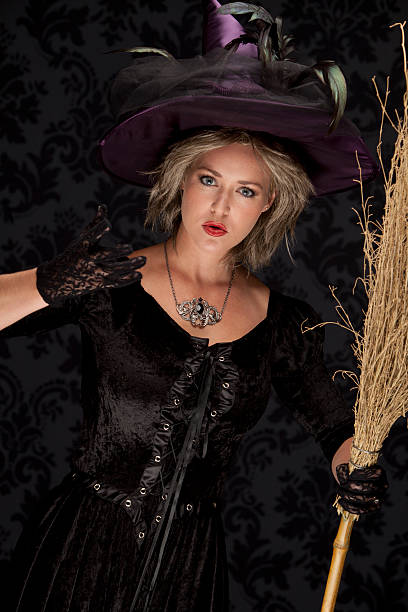 istock Happy Halloween Witch With Broom 184604137