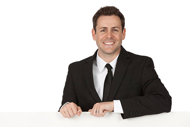 istock Happy businessman holding a placard 184604485