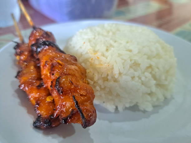 Delicious Chicken Satay Or Chicken Skin Satay With Red Spices And Rice On White Plate. Nasi Sate Ayam. Food Menu