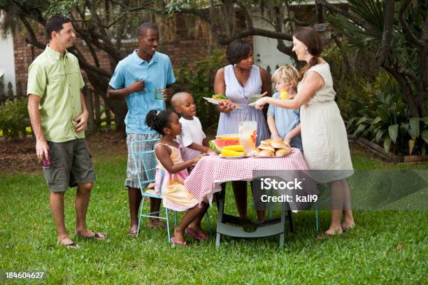 Two Families At Backyard Cookout Stock Photo - Download Image Now - African-American Ethnicity, Barbecue - Meal, Family