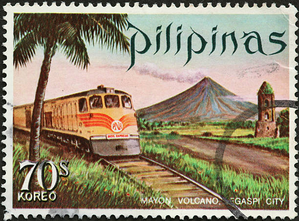 istock old train and volcano on a Philippine postage stamp 184605060